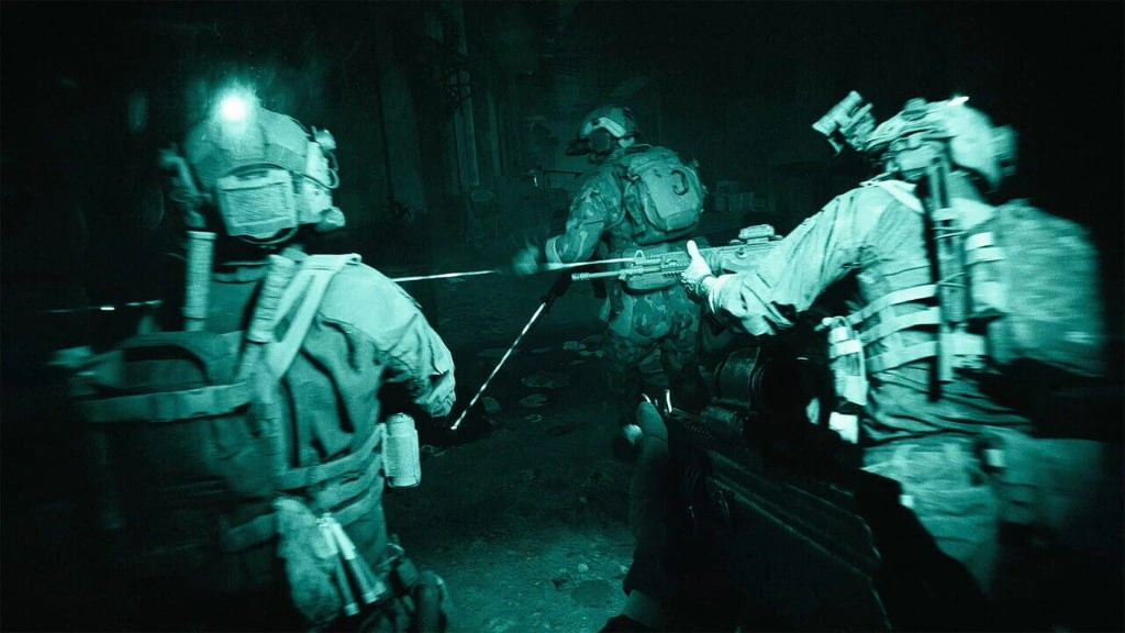 Battlefield 6 night operation with a squad moving through a dark interior