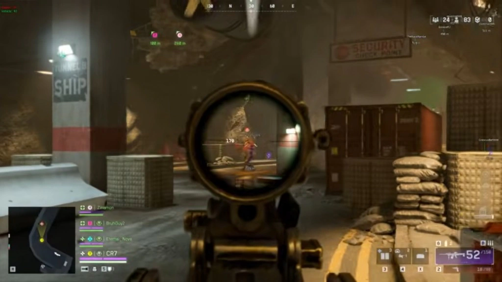 Battlefield 6 scope view tracking a player near shipping containers